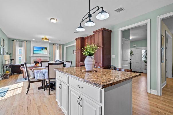 Dining room, Fireplace, Interior, Kitchen, Living room, Pendant Lights, Recessed Lighting, Wood Texture Flooring