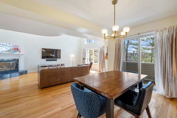 Chandelier, Dining room, Fireplace, Interior, Living room, Pendant Lights, Wood Texture Flooring