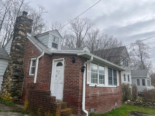 Exterior, Facade, Brick Facade, Cape Cod