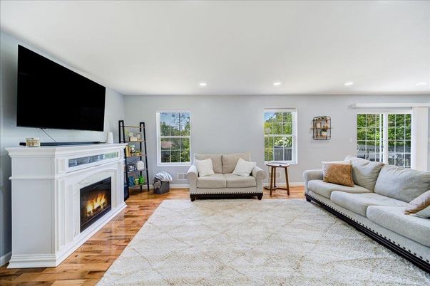 Fireplace, Interior, Living room, Recessed Lighting, Wood Texture Flooring