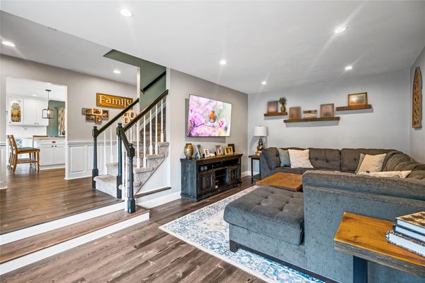 Dining room, Fireplace, Interior, Living room, Pendant Lights, Recessed Lighting, Wood Texture Flooring