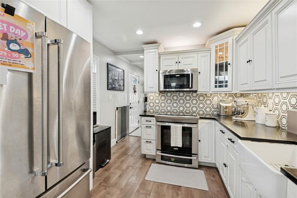 Interior, Kitchen, Recessed Lighting, Stainless Steel Appliances, Wood Texture Flooring