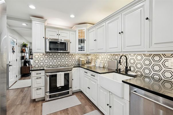 Interior, Kitchen, Recessed Lighting, Stainless Steel Appliances, Wood Texture Flooring