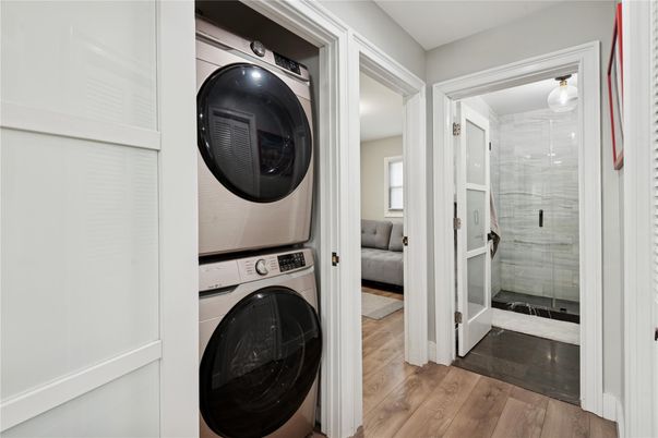 Bathroom, Glass Shower, Interior, Utility Closets, Washer, Wood Texture Flooring