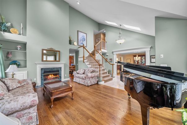Fireplace, Interior, Living room, Pendant Lights, Piano, Recessed Lighting, Wood Texture Flooring