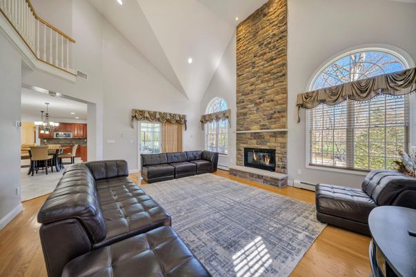 Chandelier, Dining room, Fireplace, Interior, Kitchen, Living room, Recessed Lighting, Stone Walls, Wood Texture Flooring