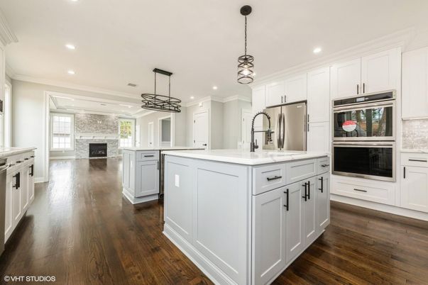 Fireplace, Interior, Kitchen, Pendant Lights, Recessed Lighting, Stainless Steel Appliances, Wood Texture Flooring