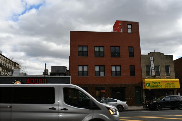 Exterior, Facade, Brick Facade, Condo Building