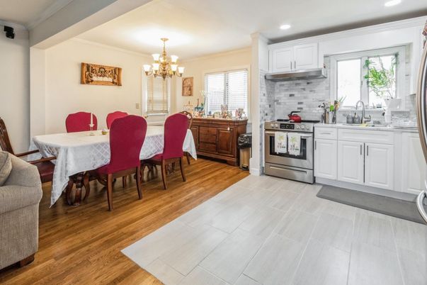Chandelier, Dining room, Interior, Kitchen, Recessed Lighting, Stainless Steel Appliances, Wood Texture Flooring
