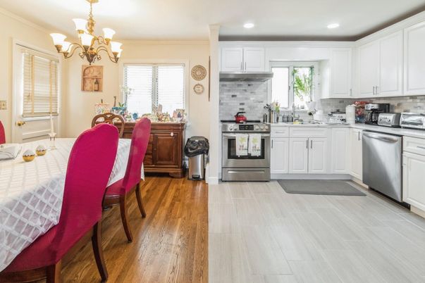 Chandelier, Dining room, Interior, Kitchen, Recessed Lighting, Stainless Steel Appliances, Wood Texture Flooring