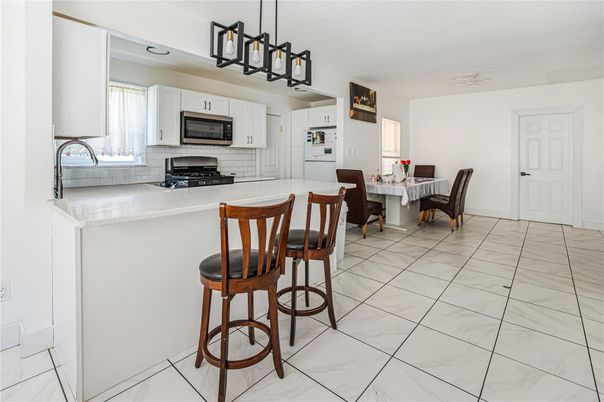Dining room, Interior, Kitchen, Marble, Pendant Lights, Stainless Steel Appliances