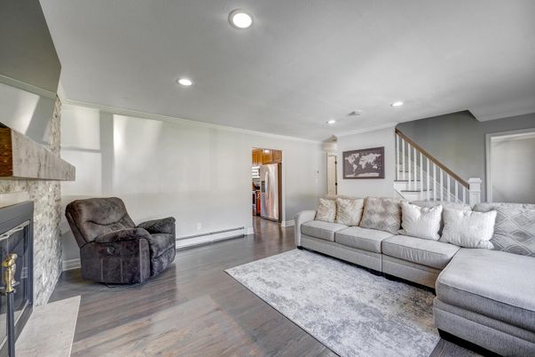 Fireplace, Interior, Living room, Recessed Lighting, Wood Texture Flooring
