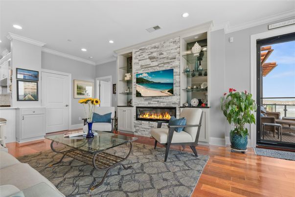 Fireplace, Interior, Living room, Recessed Lighting, Stone Walls, Wood Texture Flooring