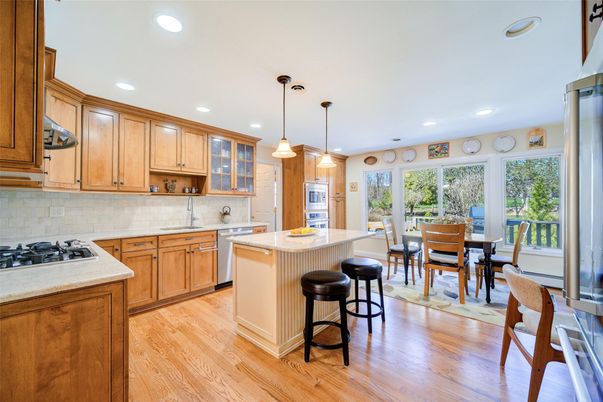 Dining room, Interior, Kitchen, Pendant Lights, Recessed Lighting, Stainless Steel Appliances, Wood Texture Flooring