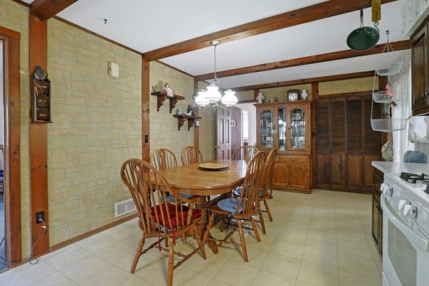 Chandelier, Dining room, Interior, Pendant Lights, Stone Walls, Wooden Beams