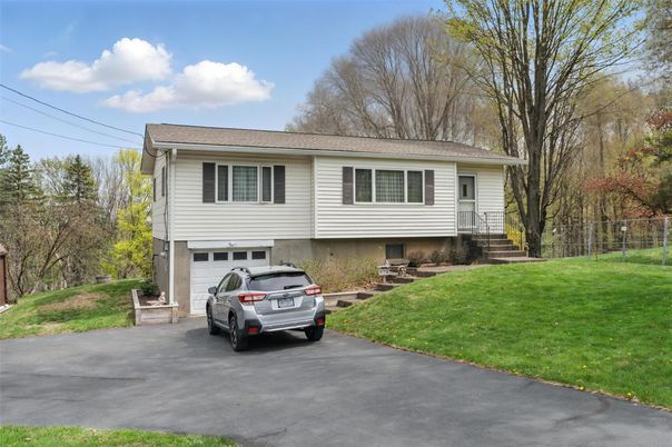 Attached, Exterior, Facade, Raised Ranch