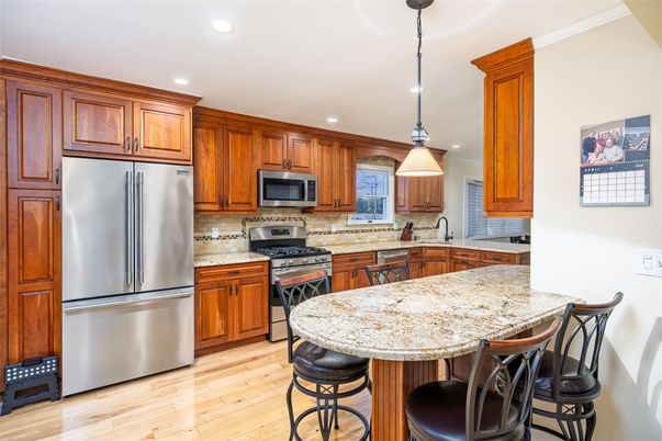 Interior, Kitchen, Pendant Lights, Recessed Lighting, Stainless Steel Appliances, Wood Texture Flooring