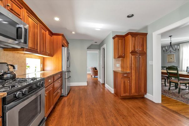 Chandelier, Dining room, Interior, Kitchen, Recessed Lighting, Stainless Steel Appliances, Wood Texture Flooring