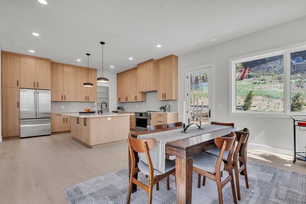 Dining room, Interior, Kitchen, Pendant Lights, Recessed Lighting, Stainless Steel Appliances, Wood Texture Flooring