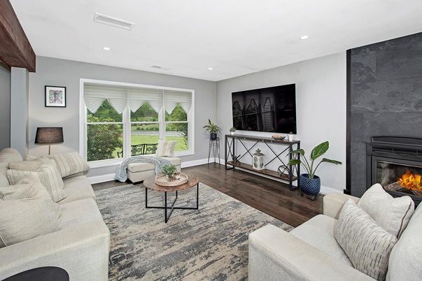 Fireplace, Interior, Living room, Recessed Lighting, Wood Texture Flooring