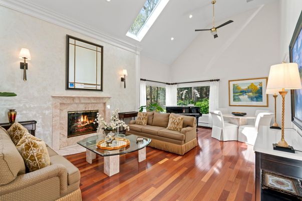 Fireplace, Interior, Living room, Piano, Recessed Lighting, Wood Texture Flooring