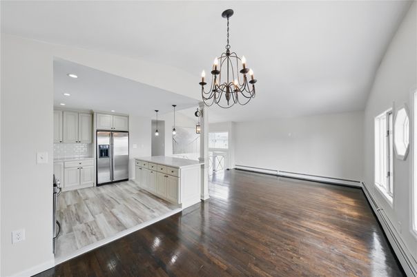 Chandelier, Interior, Kitchen, Pendant Lights, Recessed Lighting, Stainless Steel Appliances, Wood Texture Flooring