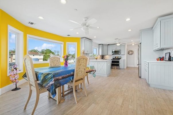 Dining room, Interior, Kitchen, Recessed Lighting, Stainless Steel Appliances, Wood Texture Flooring