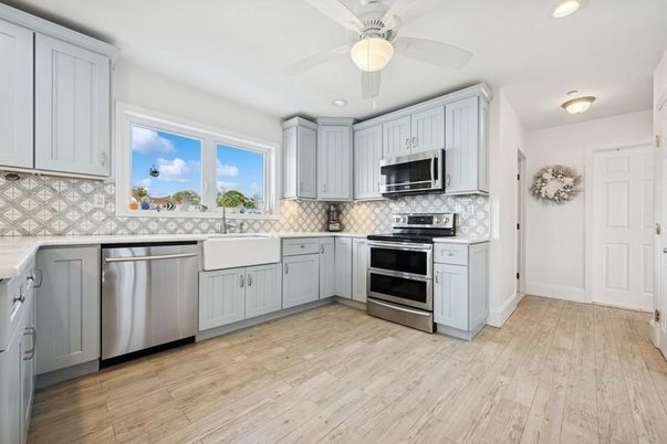 Interior, Kitchen, Recessed Lighting, Stainless Steel Appliances, Wood Texture Flooring