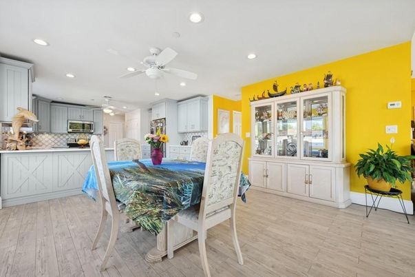 Dining room, Interior, Kitchen, Recessed Lighting, Stainless Steel Appliances, Wood Texture Flooring