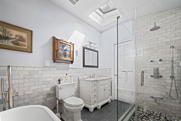 Bathroom, Dual Sink Vanities, Glass Shower, Interior, Stone Walls