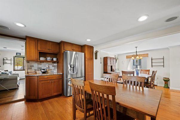 Chandelier, Dining room, Interior, Kitchen, Living room, Recessed Lighting, Stainless Steel Appliances, Wood Texture Flooring