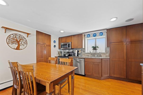 Dining room, Interior, Kitchen, Recessed Lighting, Stainless Steel Appliances, Wood Texture Flooring