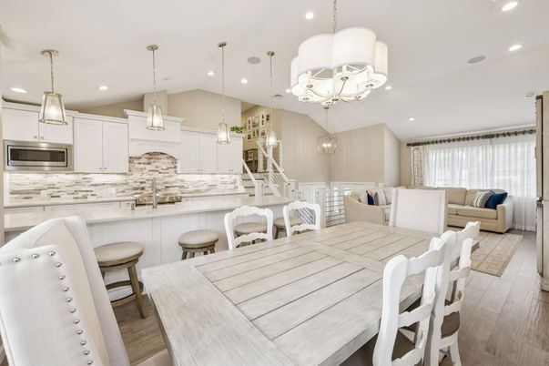 Chandelier, Dining room, Interior, Kitchen, Living room, Pendant Lights, Recessed Lighting, Stainless Steel Appliances, Wood Texture Flooring
