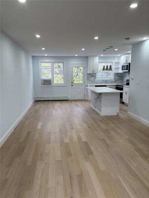 Interior, Kitchen, Marble Walls, Pendant Lights, Recessed Lighting, Wood Texture Flooring