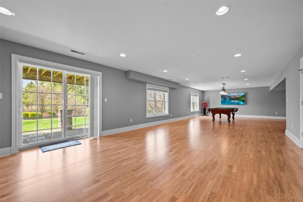 Billiard Table, Empty room, Game Room, Interior, Pendant Lights, Recessed Lighting, Wood Texture Flooring