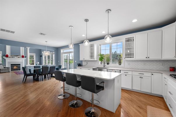 Dining room, Fireplace, Interior, Kitchen, Pendant Lights, Recessed Lighting, Wood Texture Flooring