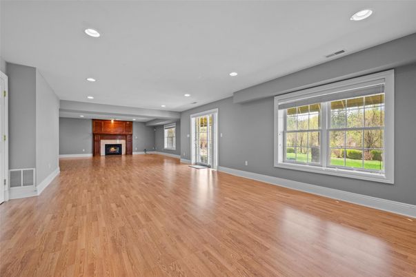 Empty room, Fireplace, Interior, Recessed Lighting, Wood Texture Flooring