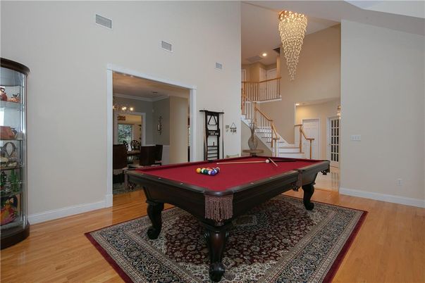 Billiard Table, Chandelier, Game Room, Interior, Recessed Lighting, Wood Texture Flooring