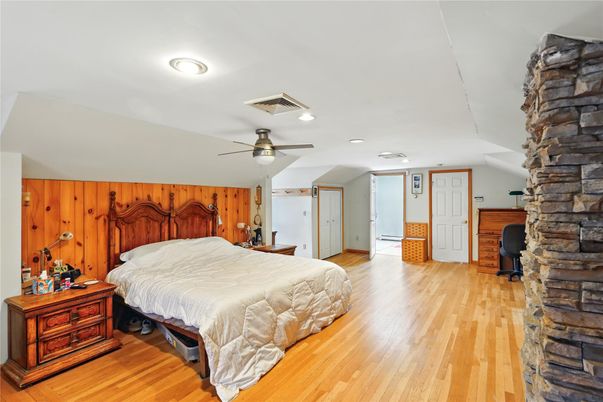 Bedroom, Fireplace, Interior, Recessed Lighting, Wood Texture Flooring