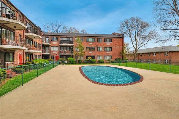 Exterior, Facade, Brick Facade, Pool, Condo Building