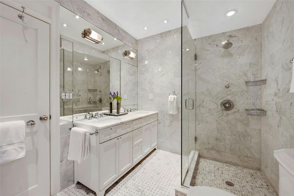 Bathroom, Dual Sink Vanities, Glass Shower, Interior, Marble Walls, Recessed Lighting