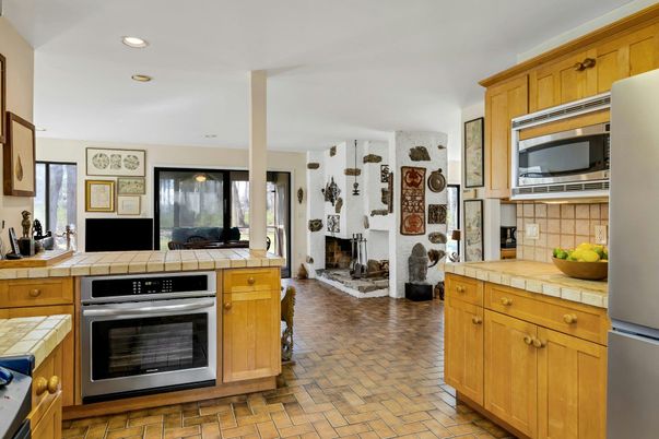 Fireplace, Interior, Kitchen, Recessed Lighting, Stainless Steel Appliances, Tile Countertops