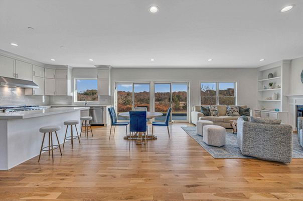 Dining room, Fireplace, Interior, Kitchen, Living room, Recessed Lighting, Stainless Steel Appliances, Wood Texture Flooring