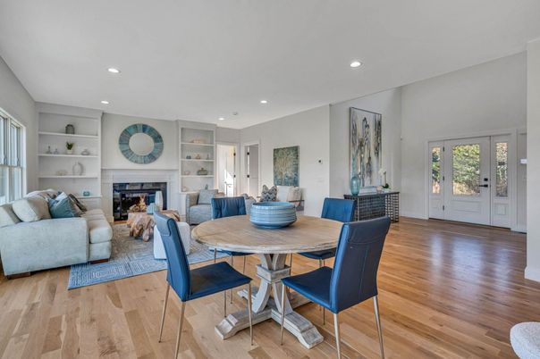 Dining room, Fireplace, Interior, Living room, Recessed Lighting, Wood Texture Flooring