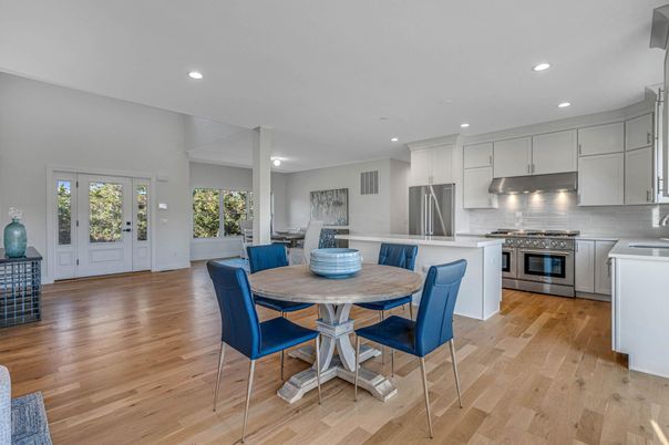 Dining room, Interior, Kitchen, Recessed Lighting, Stainless Steel Appliances, Wood Texture Flooring