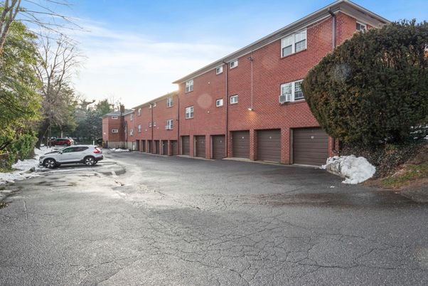 Attached, Exterior, Facade, Brick Facade, None