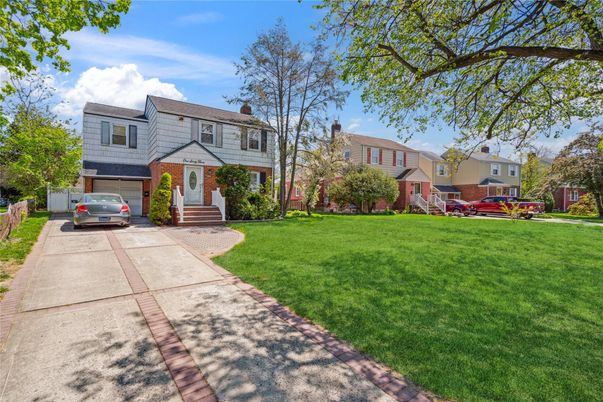 Attached, Exterior, Facade, Brick Facade, Raised Ranch