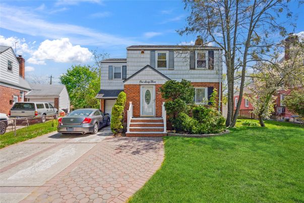 Exterior, Facade, Brick Facade, Raised Ranch