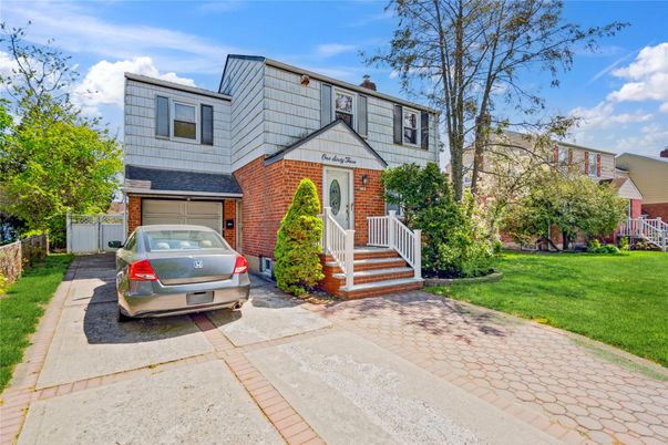 Attached, Exterior, Facade, Brick Facade, Tudor Revival