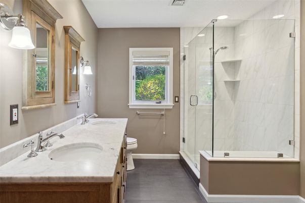 Bathroom, Dual Sink Vanities, Glass Shower, Interior, Marble Walls, Recessed Lighting